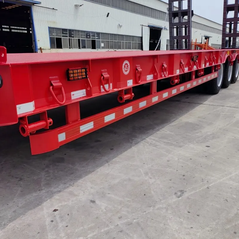 Translations of 60 Ton Payload Lowbed Trailer 3 Axles 12 Tires Translations of 60 Ton Payload Lowbed Trailer 3 Axles 12 Tires